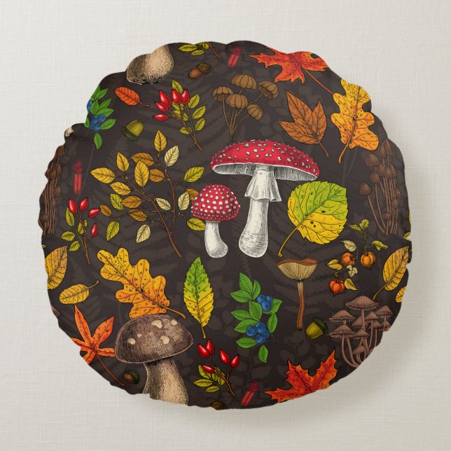 Autumn mushrooms, leaves, nuts and berries on dark round pillow (Front)