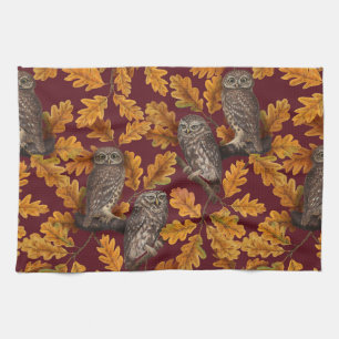 Autumn owls on dark red kitchen towel