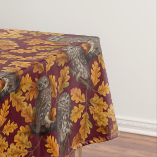 Autumn owls on dark red tablecloth