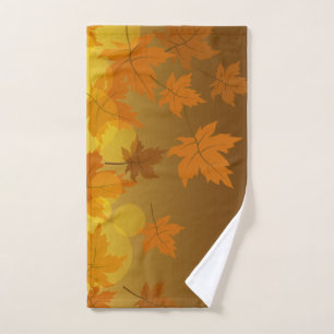 Autumn pattern with falling maple leaves and bokeh hand towel