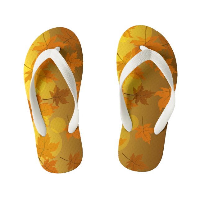Autumn pattern with falling maple leaves and bokeh kid's flip flops (Footbed)