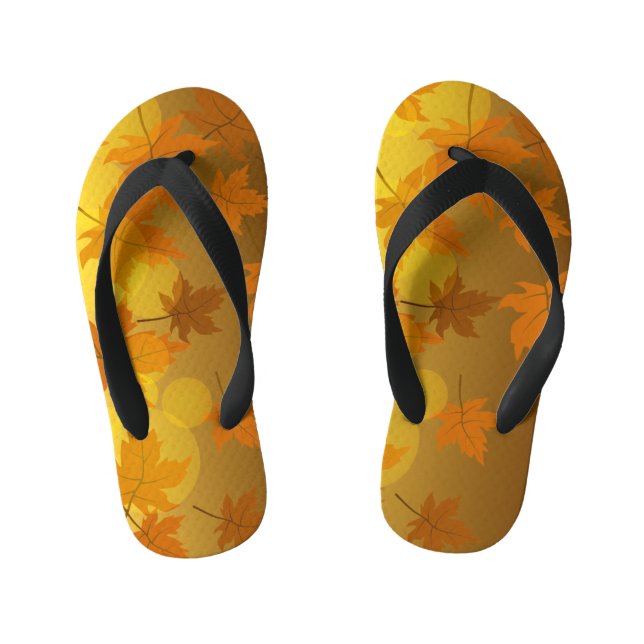 Autumn pattern with falling maple leaves and bokeh kid's flip flops (Footbed)