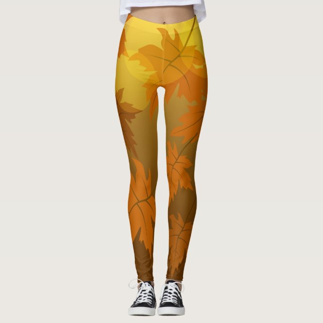 Autumn pattern with falling maple leaves and bokeh leggings (Front)