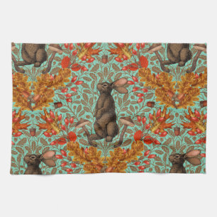 Autumn rabbit on light green kitchen towel