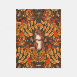 Autumn squirrel on dark brown fleece blanket