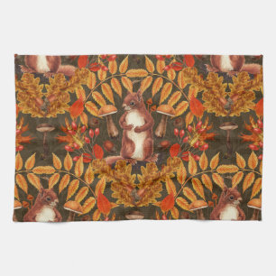 Autumn squirrel on dark brown kitchen towel