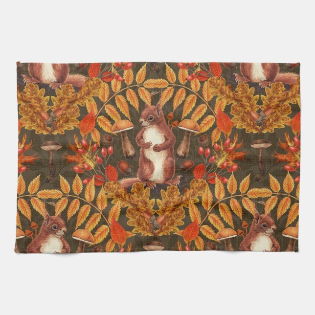 Autumn squirrel on dark brown kitchen towel (Horizontal)