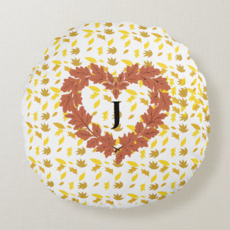 autumn wreath on its bed of leaves round pillow
