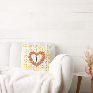 autumn wreath on its bed of leaves throw pillow
