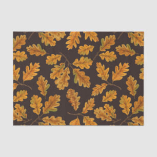 Autumnal oak leaves on dark brown tissue paper