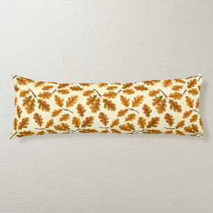 Autumnal oak leaves on off white body pillow