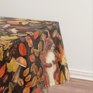 Autumnal squirrels and flora on dark brown tablecloth