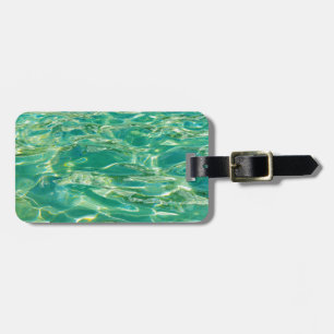 Azure water under bright noon sun luggage tag