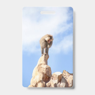 Baboon monkey on top of a mountain badge