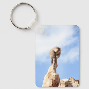Baboon monkey on top of a mountain keychain
