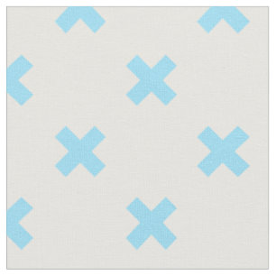 Baby blue cross stitches on white fabric
