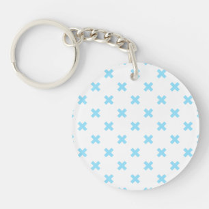 Baby blue cross stitches on white keychain