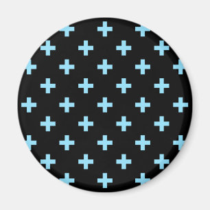 Baby blue polka crosses on black magnet