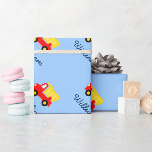 Baby blue wrapping paper with toy dump truck