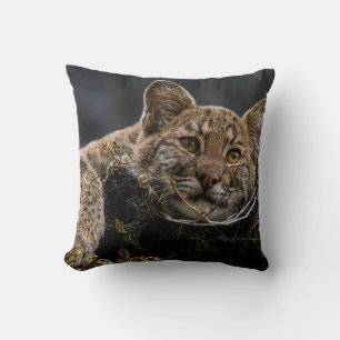 Baby Bobcat Lying in Tree Throw Pillow