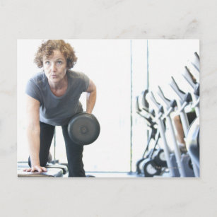 Baby boomer woman working out triceps in health postcard