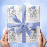 Baby Boy First Christmas Elephant Blue Snow Name Wrapping Paper Sheet<br><div class="desc">Recognize a baby boy's First Christmas with this personalized giftwrap set of 3 sheets featuring a cute watercolor baby boy elephant wearing a blue stocking cap and holding a blue Christmas ornament surrounded by snowflakes with your choice of text (the sample shows NAME'S FIRST CHRISTMAS) in your choice of font...</div>