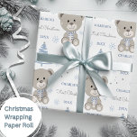 Baby Boys First Christmas Teddy Bear Blue Wrapping Paper<br><div class="desc">Make their very first Christmas special with personalized wrapping paper featuring a cute teddy bear,  tree and snowflakes.  Easily update the name and year and be sure to check out my collection for lots more choices.</div>