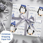 Baby Boys First Christmas Winter Penguin Blue Wrapping Paper<br><div class="desc">Make their very first Christmas special with personalized wrapping paper featuring a cute winter penguin,  tree and snowflakes.  Easily update the name and year and be sure to check out my collection for lots more choices.</div>