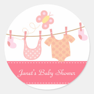 Baby clothes hanging on clothesline with butterfly classic round sticker