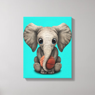Baby Elephant Playing With Basketball Canvas Print