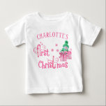 Baby First Christmas Pink Snowman and Snowflakes Baby T-Shirt<br><div class="desc">Personalized First Christmas T-Shirt with a cute snowman and pink, candy cane typography. The wording reads "[your name's] first Christmas" and the template is set up for you to add baby's name. The design features a cartoon snowman with beautifully gift wrapped xmas presents, snowflakes and stars. Lovely top for a...</div>