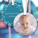 Baby First Hanukkah Stars Snowflakes New Parents Ornament<br><div class="desc">“First Hanukkah.” A playful visual of white Stars of David, snowflakes and handwritten script typography with customized year, overlaying the photo of your choice, help you usher in Hanukkah and New Year. On the back, additional white Stars of David, snowflakes and handwritten typography with “proud mom & dad of baby’s...</div>