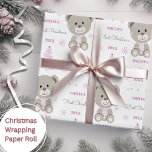 Baby Girls First Christmas Teddy Bear Pink Wrapping Paper<br><div class="desc">Make their very first Christmas special with personalized wrapping paper featuring a cute teddy bear,  tree and snowflakes.  Easily update the name and year and be sure to check out my collection for lots more choices.</div>