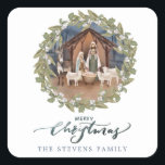 Baby Jesus in the Manger Nativity  Square Sticker<br><div class="desc">These traditional Christmas stickers feature a nativity image of baby Jesus sleeping in a manger with Mary and Joseph in the centre surrounded by a berry wreath. Below are the words "Merry Christmas."  You can personalize with your name.</div>