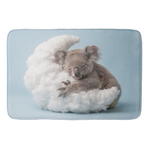 Baby Koala Sleeping Peacefully on a Fluffy Moon Bath Mat