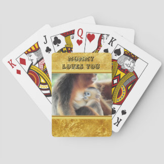 Baby Monkey sucking it's mothers milk. Playing Cards