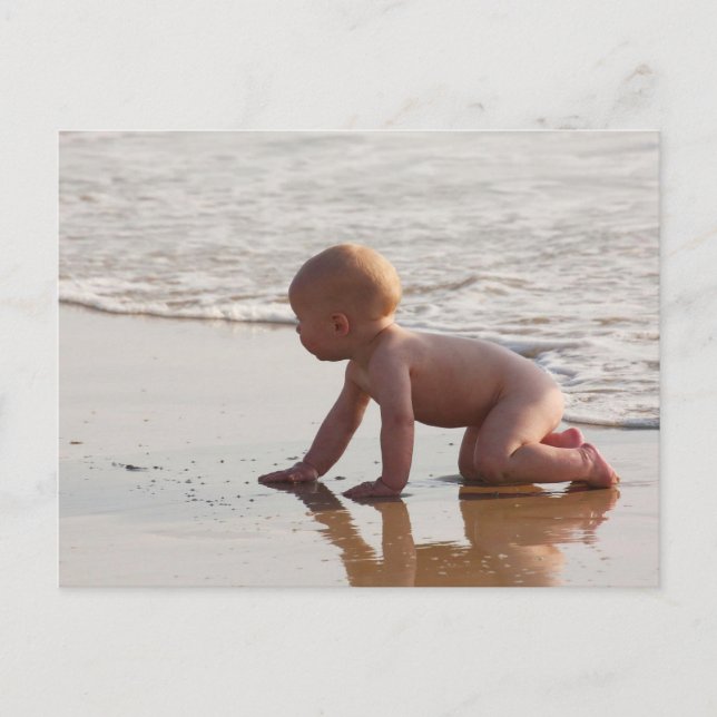 Baby playing in the sand on the beach postcard (Front)