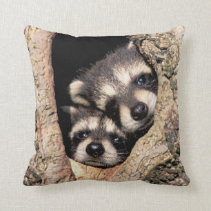 Baby Raccoons Peeking out of Tree Throw Pillow
