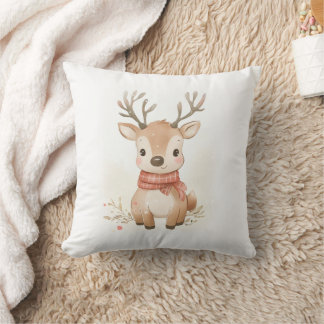 Baby reindeer sitting in the snow throw pillow