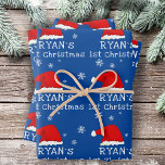 Baby`s First Christmas Blue Santa Hat Snowflake Wrapping Paper Sheet<br><div class="desc">Baby`s First Christmas Blue Red Santa Hat Snowflake Wrapping Paper Sheets. Cute baby first Christmas design with a Santa hat,  snowflakes and a baby name in a white script - personalize with your baby`s name.</div>