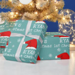 Baby`s First Christmas Red Santa Hat Snowflake  Wrapping Paper<br><div class="desc">Baby`s First Christmas Red Santa Hat Snowflake Wrapping Paper. Cute baby first Christmas design with a Santa hat,  snowflakes and a baby name in a white script - personalize with your baby`s name.</div>