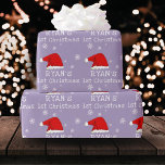 Baby`s First Christmas Red Santa Hat Snowflake  Wrapping Paper<br><div class="desc">Baby`s First Christmas Red Santa Hat Snowflake Wrapping Paper. Cute baby first Christmas design with a Santa hat,  snowflakes and a baby name in a white script - personalize with your baby`s name.</div>