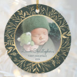 Babys 1st Christmas Photo Gold Foliage Green Round Ceramic Ornament<br><div class="desc">Celebrate baby's first Christmas with this beautiful keepsake ornament. Easily replace the sample image with your own favourite photo and customize it with baby's name in dark green script font and the year below. A white gradient screen helps make the text pop. The photo is set off by an elegant...</div>