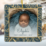 Babys 1st Christmas Photo Teal Blue Gold Foliage Ceramic Ornament<br><div class="desc">Celebrate baby's first Christmas with this beautiful keepsake ornament. Easily replace the sample image with your own favourite photo and customize it with baby's name in teal blue script font and the year below. A white gradient screen helps make the text pop. The photo is set off by an elegant...</div>