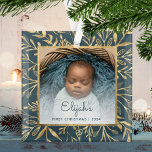 Babys 1st Christmas Photo Teal Blue Gold Foliage Glass Ornament<br><div class="desc">Celebrate baby's first Christmas with this beautiful keepsake ornament. Easily replace the sample image with your own favourite photo and customize it with baby's name in teal blue script font and the year below. A white gradient screen helps make the text pop. The photo is set off by an elegant...</div>