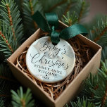 Baby's First Christmas Custom Name Photo Keepsake Ornament<br><div class="desc">Special keepsake ornament to commemorate baby's first Christmas. Design features a simple minimal design with "Baby's First Christmas" displayed in elegant script and serif text pairing with a photo displayed in the background with a white transparent overlay. Personalize with the baby's name and the year. The reverse side features the...</div>