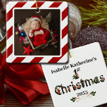 Baby's First Christmas Keepsake Memories  Ceramic Ornament<br><div class="desc">Baby's First Christmas Keepsake Ornament | Baby's photo is framed with a festive candy cane stipe design. The back of the ornament has (Baby's Name)'s 1st Christmas along with the year. The typography is an old English style type with each letter decorated with vintage Santa's for a festive look. Baby's...</div>