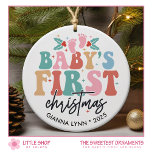Babys First Christmas Photo Ceramic Ornament<br><div class="desc">Celebrate life’s milestones with this custom two-sided Christmas ornament that features colourful typography that says, “Baby’s First Christmas.” The front features a cheerful palette of pink, blue, yellow, and green, adorned with a simple illustration of holly, mistletoe, and twinkling stars. Add a personal touch by including the baby’s name and...</div>