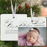 Baby's First Christmas Photo Elegant Calligraphy Ceramic Ornament<br><div class="desc">Baby's First Christmas photo ornament which you can personalize with your favourite photo and custom wording on the back. Elegant typographic design lettered with Baby's First Christmas in swirly calligraphy and classic print.</div>