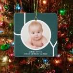 Baby's First Christmas Photo Green  Ceramic Ornament<br><div class="desc">This stylish Baby's First Christmas Photo Ornament is decorated with the word JOY in white on a green background.
Easily customizable with your photo and name.</div>